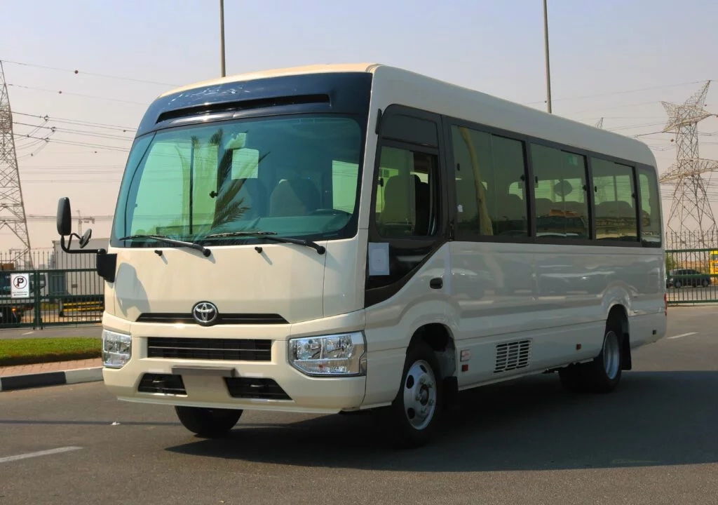 https://wellcaretransport.com/wp-content/uploads/2025/04/Toyota-Coaster-–-30-Seater-1.webp